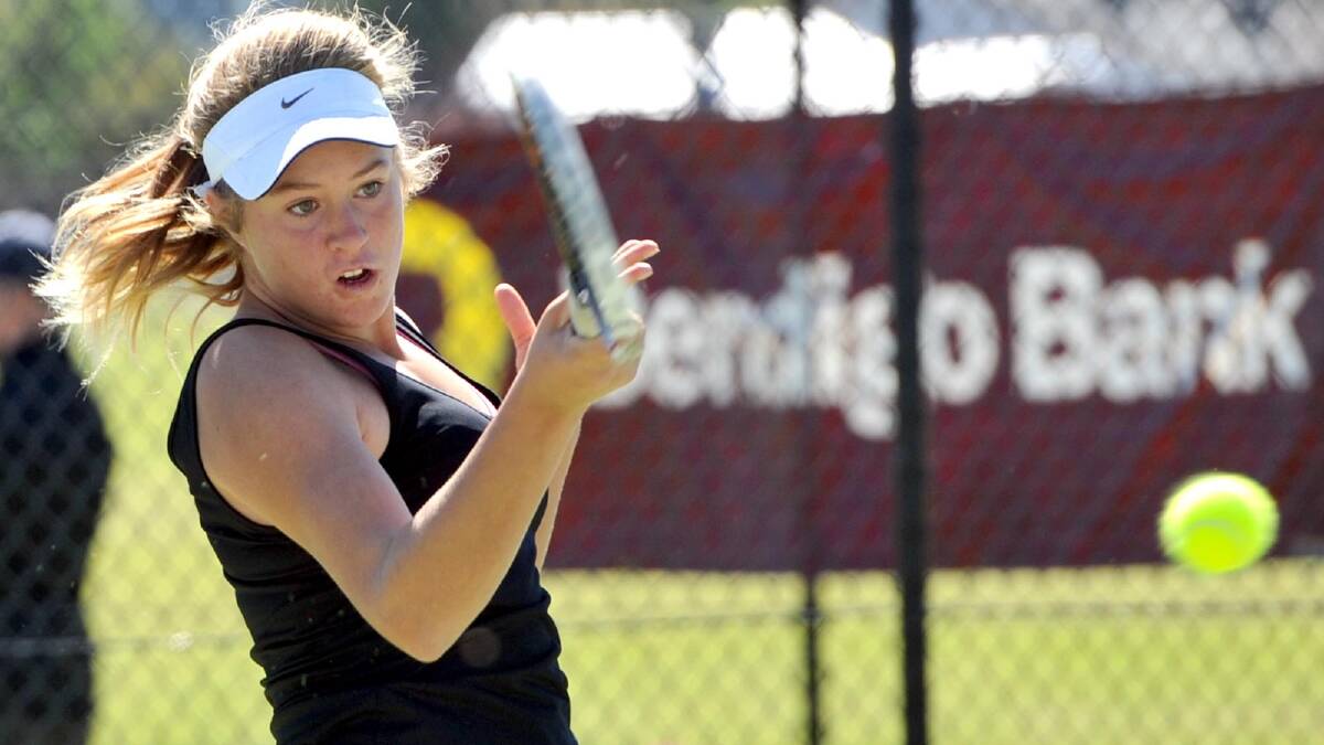 Kaitlin Staines, 13, cracks a forehand on the way to winning the Riverina Open.