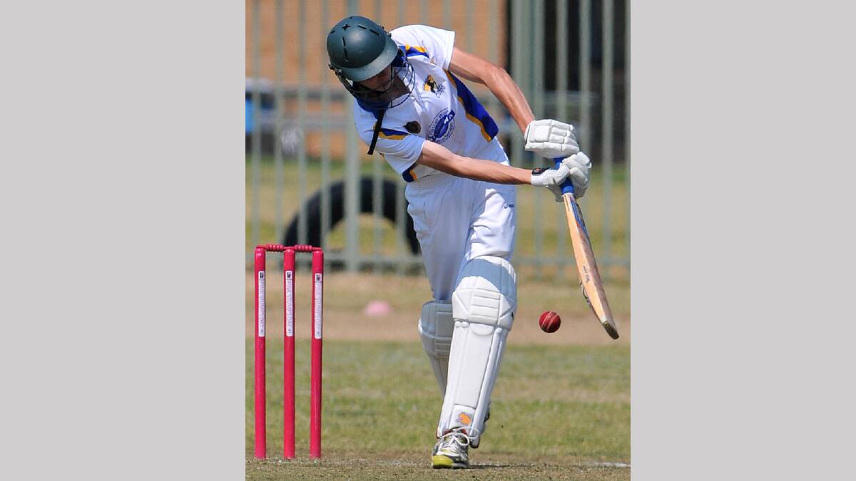Kooringal's Michael Whiting tries to play a ball off his pads in junior cricket against Lake Albert. Picture: Michael Frogley