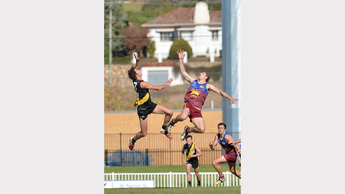  Bradley Graham (left) and Jacob Olsson leap high in a ruck contest. Picture: Michael Frogley