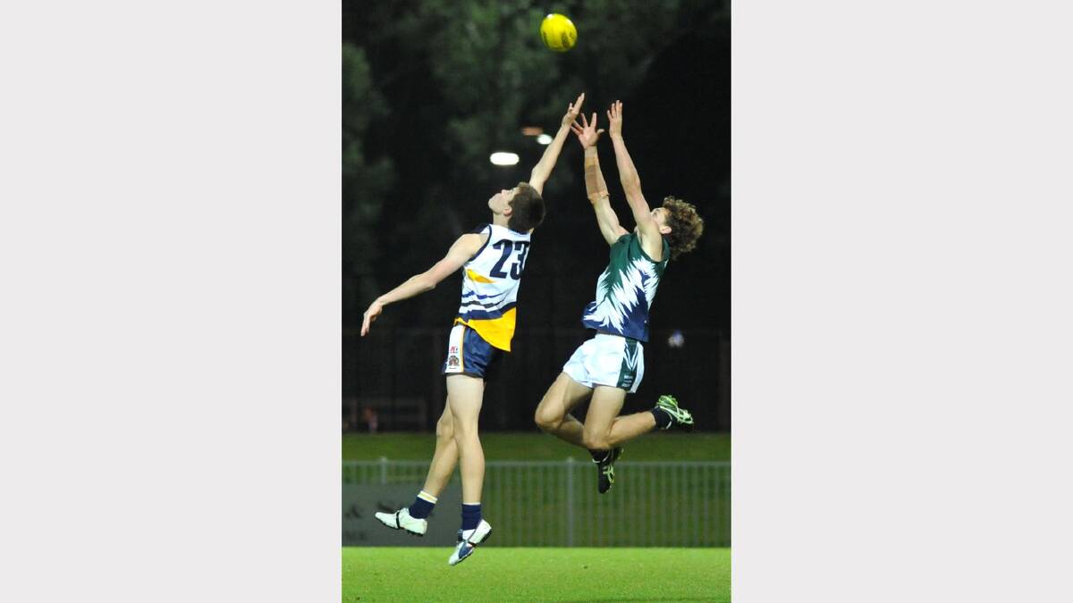 TRAC's Liam McGregor tries to take a mark as the ball floats over Kooringal's Fraser Noack. Picture: Les Smith