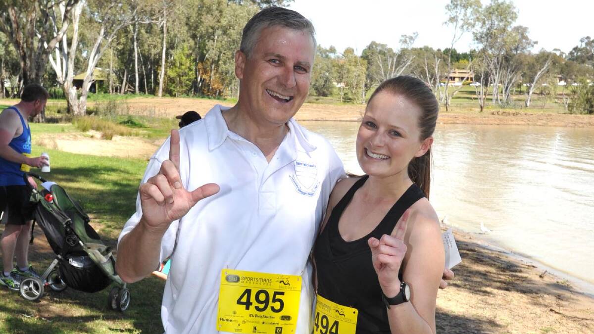 Lake to Lagoon 2013 -  Michael McCormack completes the course with daughter Georgina, who finished narrowly ahead of her father. Picture: Les Smith
