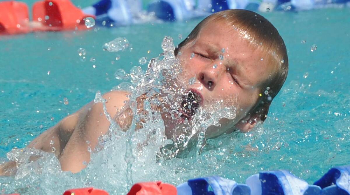 Jackson Dennis, 9, in a 25m freestyle race. Picture: Les Smith