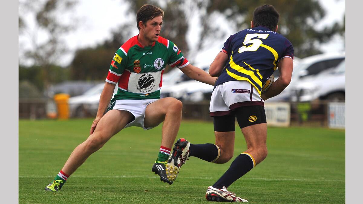 Wagga Brothers new recruit Travis Lightfoot attempts to tackle Bidgee Hurricanes winger Keiran Cates. Picture: Addison Hamilton