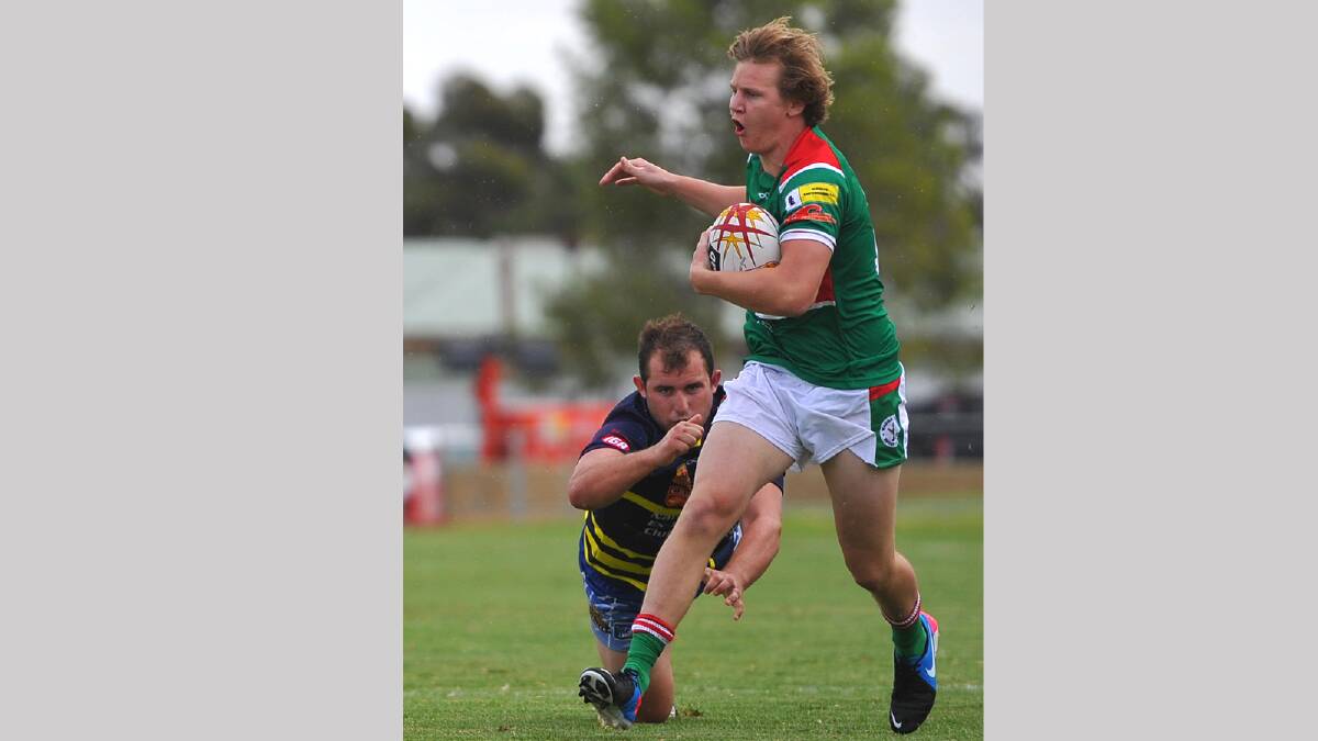 Wagga Brothers' Brent Neave looks to evade Bidgee Hurricanes' Sean Royal. Picture: Addison Hamilton