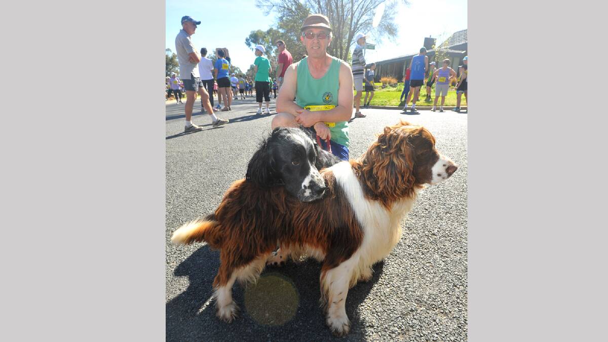 Lake to Lagoon 2013 - John Whitfield with his dogs Jethro and Jock before the start of the race. Picture: Addison Hamilton