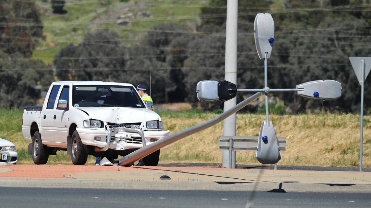 A driver walked away after the ute he was driving collided with the roundabout on the corner of Kooringal Road and Copland Street. Picture: Alastair Brook