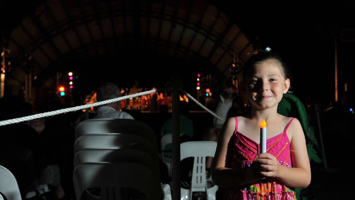 Ashlyn Merrett, 8, at the Wagga Christmas Spectacular at the Wagga Music Bowl. Picture: Addison Hamilton