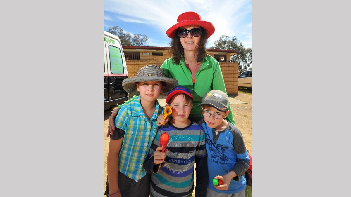 Jennifer Sexton with Helena Corkhill, 9, Sam Corkhill, 6, and James Corkhill, 6, at the Culcairn Centenary Show. Picture: Les Smith