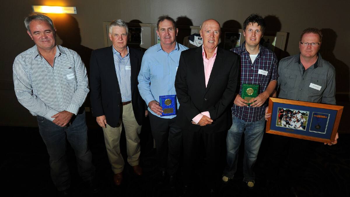Kerry O'Keeffe (fourth from left) with St Michaels premiership-winning Peter Engelbrecht, Alan Johnston, Anthony Baker, Jimmy Elliott and Ian Donohue. Picture: Addison Hamilton