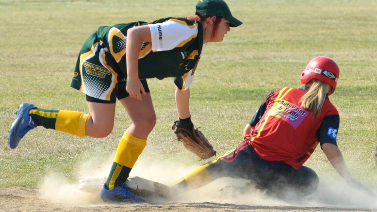 Turvey Park's Amanda Wheeler makes it safely to second base as Kiara Ervine attempts the tag. Picture: Les Smith
