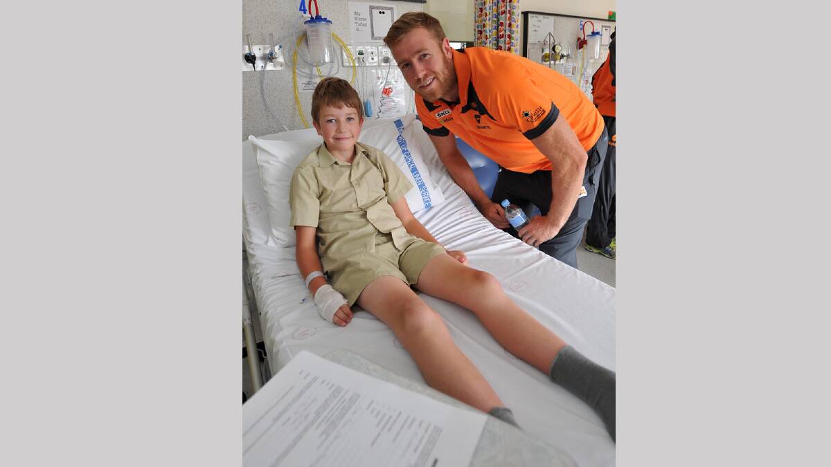 Peter Froon, 11, of Marrar meets with Jon Giles at the Wagga Base Hospital. Picture: Michael Frogley