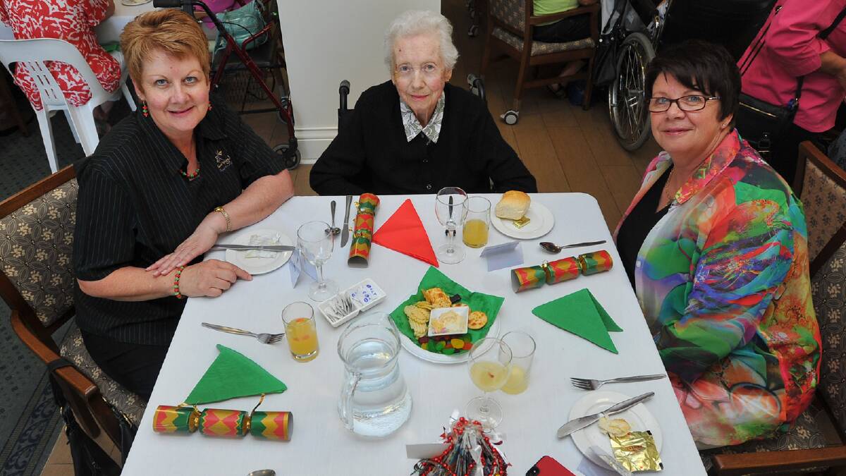 Kerry Moon, Veronica Rodd and Michelle Pattison at the RSL Remembrance Village christmas party. Picture: Addison Hamilton 
