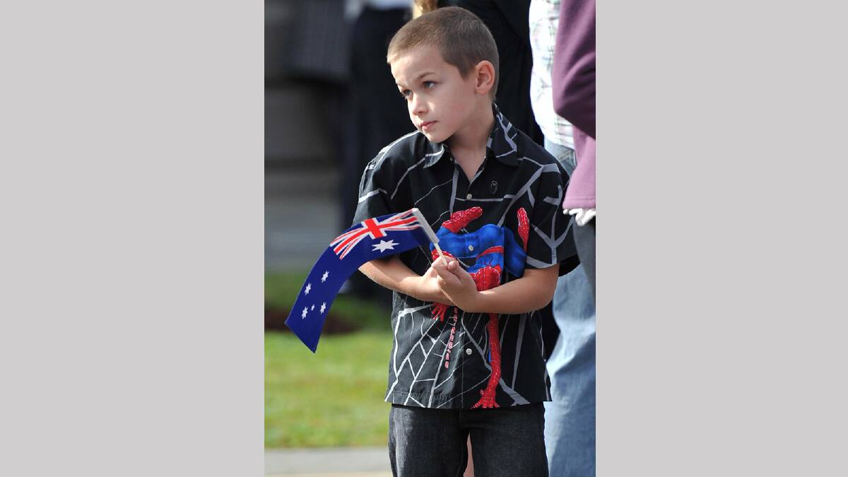 James Collins, 7, watching Anzac Day march in Wagga. Picture: Michael Frogley