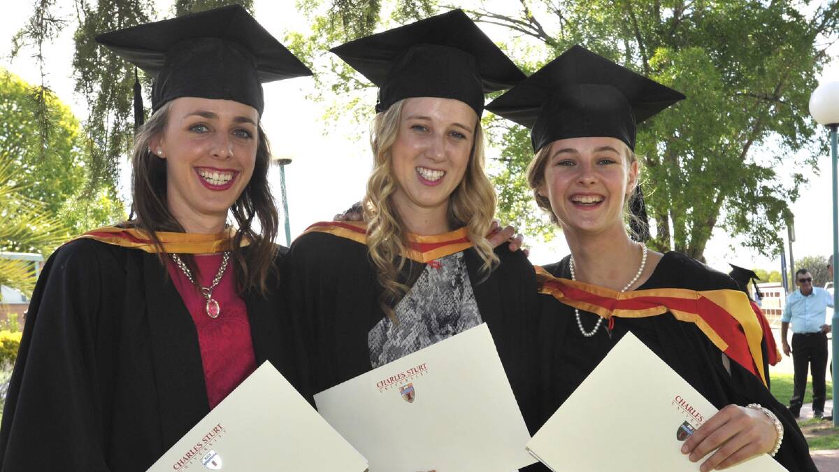 CSU nursing graduates Anna Andrews, Georgina Grigg and Rosie Rand. Picture: Les Smith