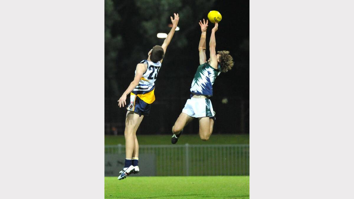 TRAC's Liam McGregor tries to take a mark as the ball floats over Kooringal's Fraser Noack. Picture: Les Smith
