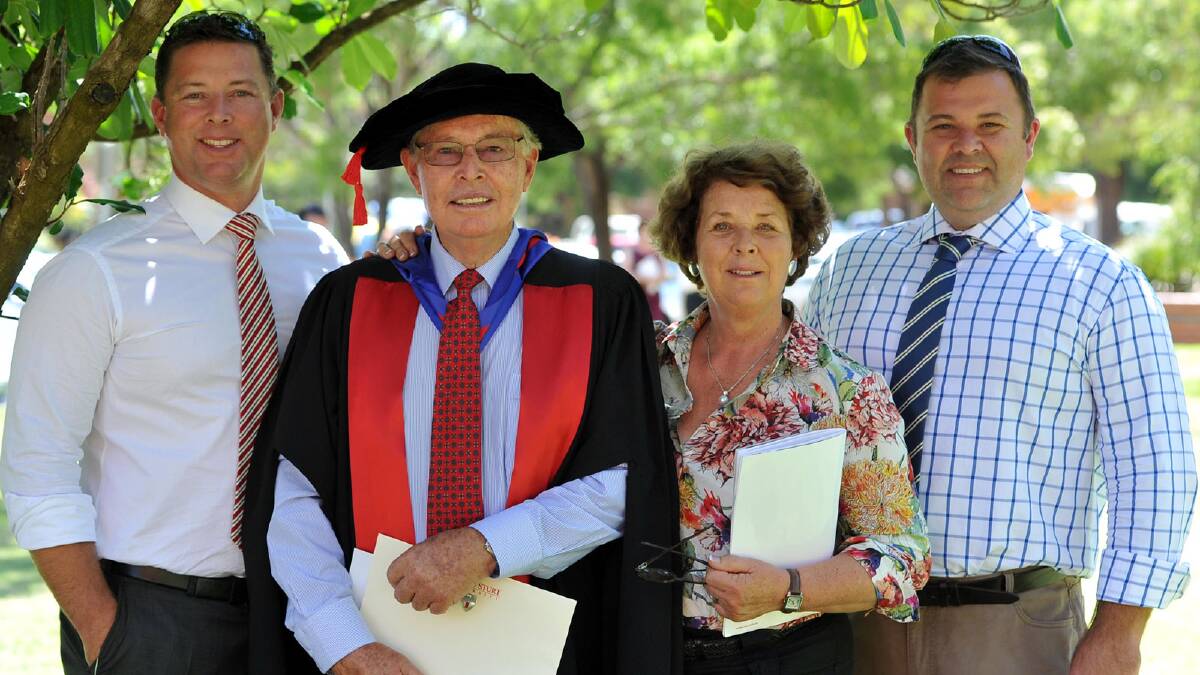 Dr Tim Hutchings with his Doctor of Philosophy celebrated with his family Jeremy, Dianna and Simon Hutchings. Picture: Michael Frogley