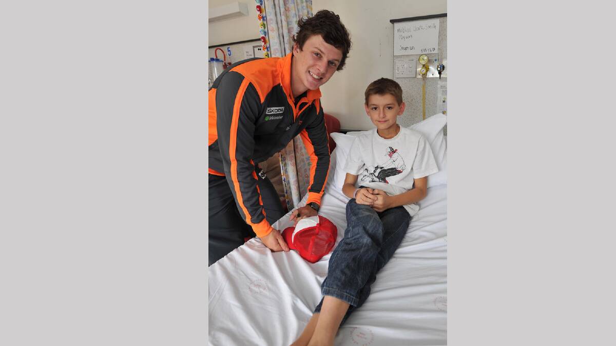 Kurt Aylett  with Michael Clark-Smith, 10, of Young at the Wagga Base Hospital. Picture: Michael Froglet