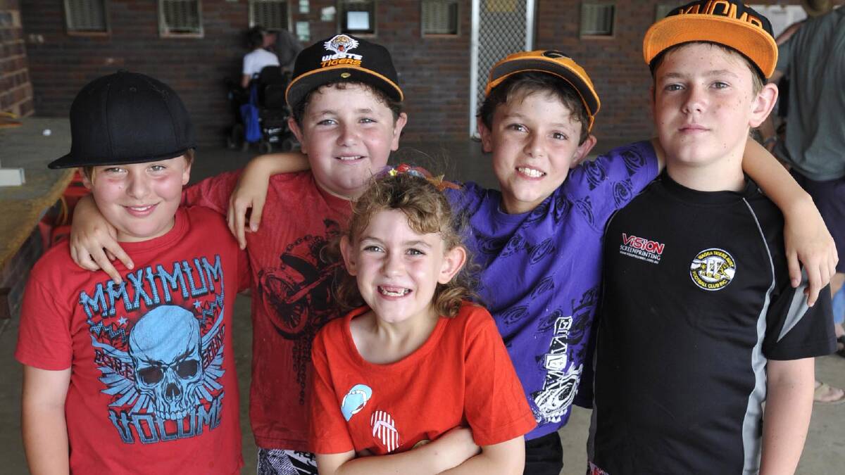 Nathan Dohl, 9, Luke Quince, 10, Bonnie Quince, 7, Nicholas Quince, 9 and James Quince, 11, at the Wagga trots. Picture: Les Smith