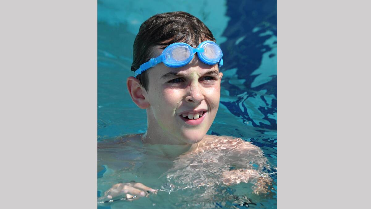 Lachlan Smith, 9, of Fraser House, after his 50m backstroke race. Picture: Les Smith
