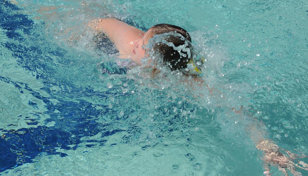 Ashley Rowe, 11, winning her 50m freestyle final. 