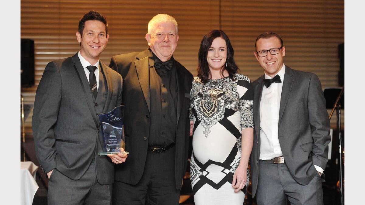 Best in Business Marketing Award winners Fitzpatricks Real Estate represented by Adam Drummond (left), Nicole McCarroll (second from right) and Josh Bett. Picture: Alastair Brook
