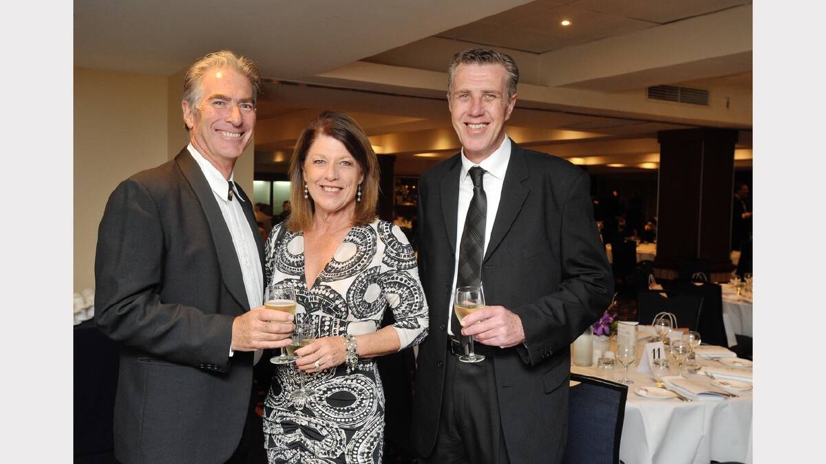 Audi Centre Wagga's Neville and Susan Jacob with Stephen Grealish at the Wagga Crow Awards. Picture: Alastair Brook 