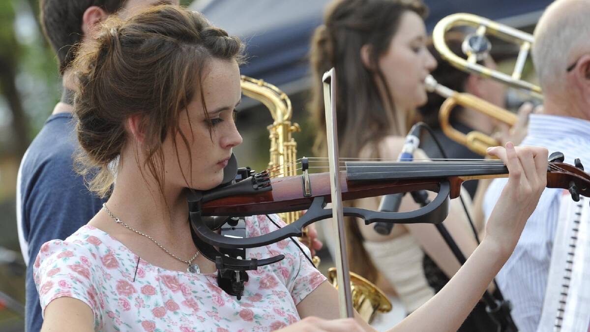 Jasmine Menzies, 16, hits the right note at Wagga's 2013 Carols in the Amphitheatre. Picture: Les Smith