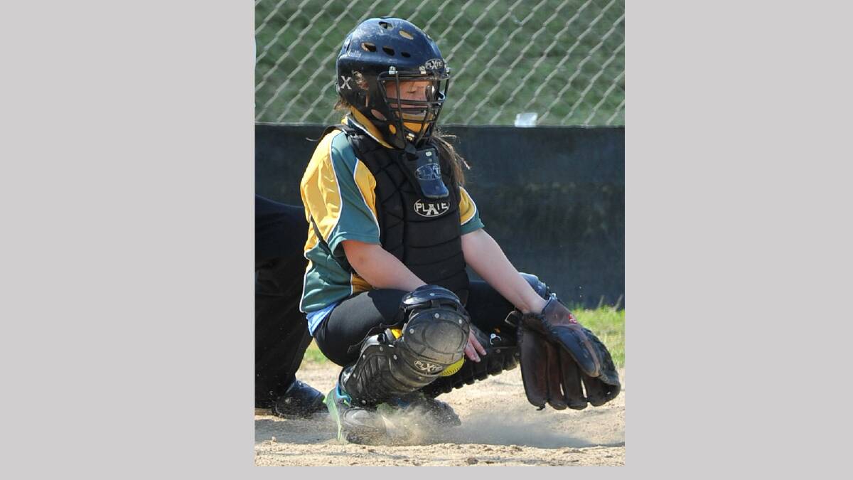 South Wagga's catcher Sherney Alexander tries to control the ball. Picture: Michael Frogley