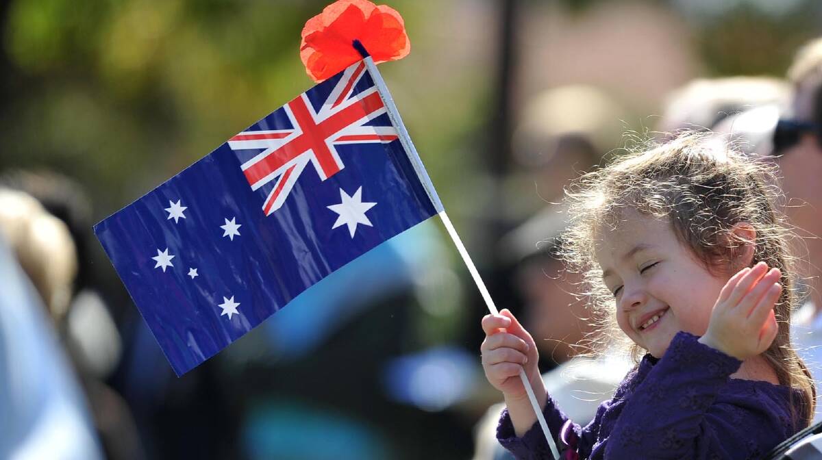 Mikaela Jensen, 3, showing her Australian spirit at the Anzac Day Commemoration Ceremony in Wagga. Picture: Michael Frogley