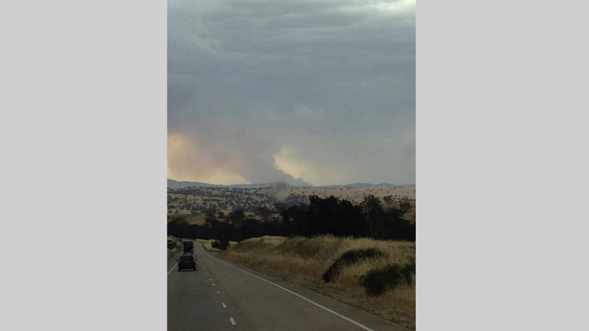 A view of the fire off the Hume Highway near Jugiong. Picture: Damien McTatts