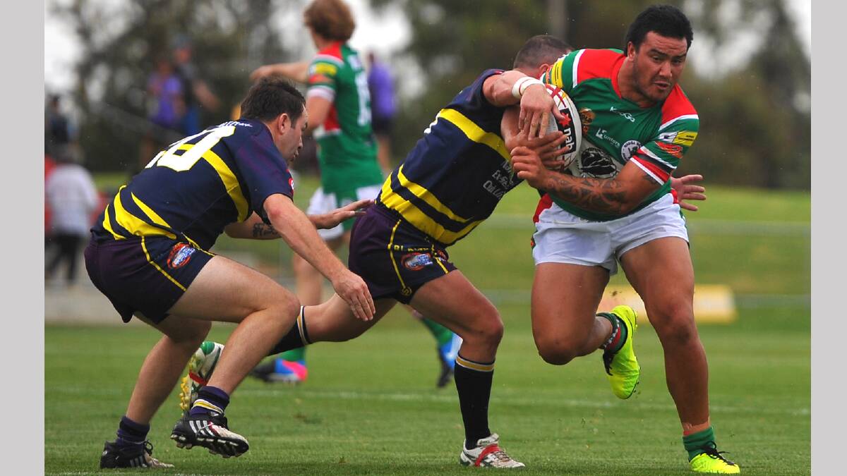 Brothers' Wierimu Hei Hei attempts to breakthrough Bidgee Hurricanes tacklers Troy Prior and Gary Ingram. Picture: Addison Hamilton