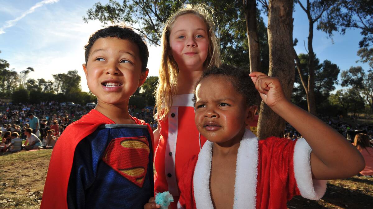 Nate Lowing, 5, Montaya Lowing, 7 and Zavier Lowing, 3, enjoying the evening out at the Wagga Christmas Spectacular. Picture: Addison Hamilton