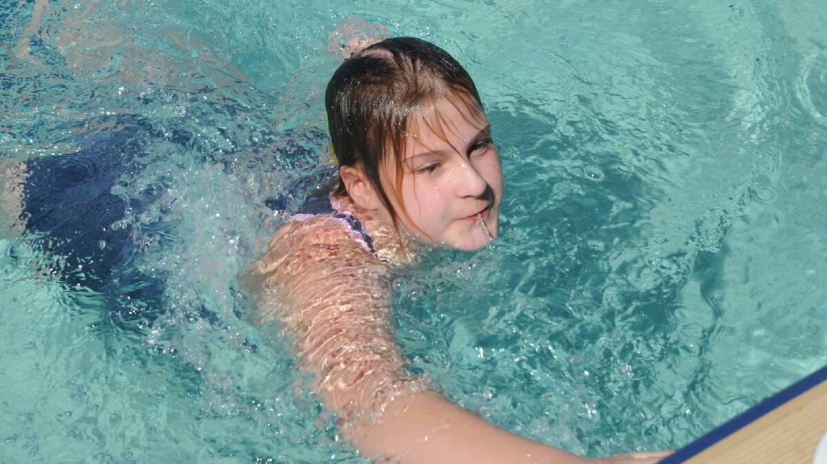 Ashley Rowe, 11, winning her 50m freestyle final. 