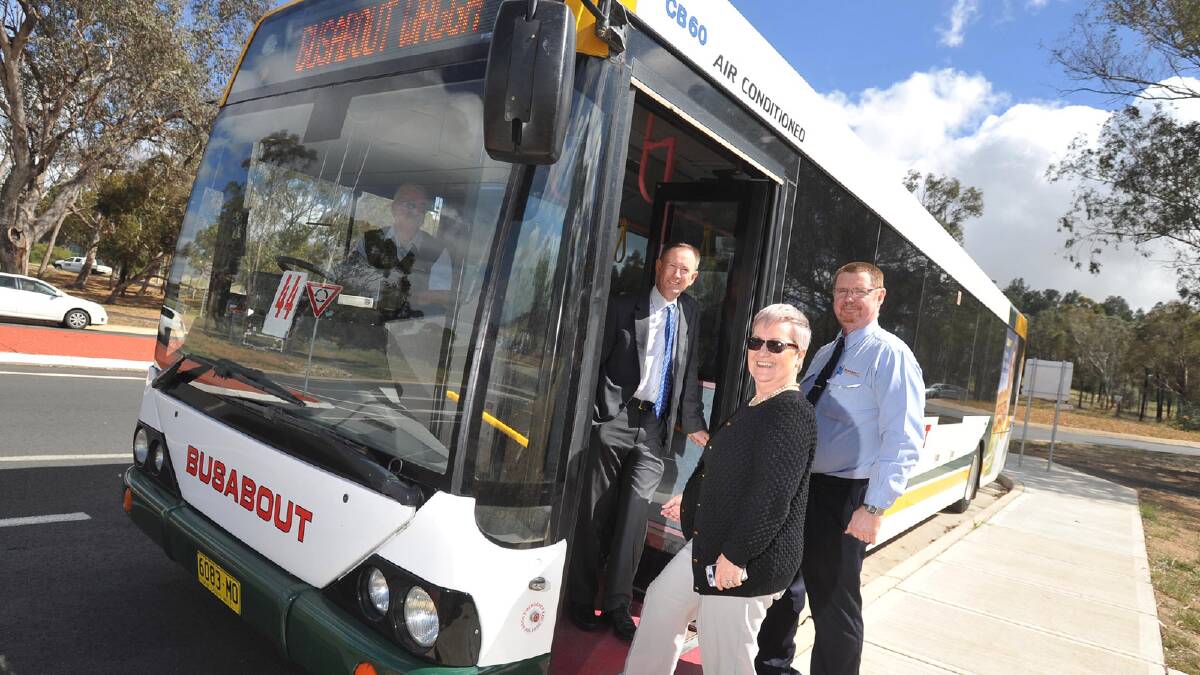 ALL ABOARD: (From left) CSU executive director of finance Paul Dowler, head of campus Miriam Dayhew and Busabout depot manager Matthew Bell test out the new bus services to the university, which will start on November 18. Picture: Alastair Brook