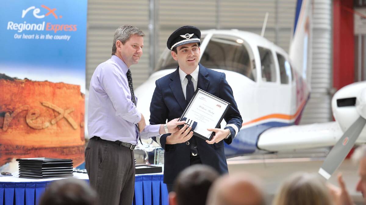  AAPA General Manager Geoffrey Cook hands certificate to William Farley. Picture: Alastair Brook