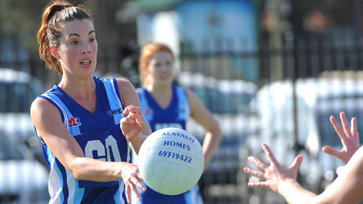 Farrer League goal defence Simone Coote fires a pass to a teammate. Picture: Addison Hamilton