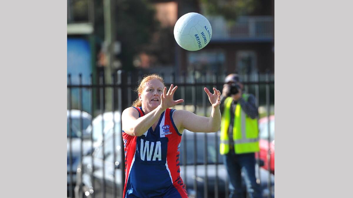 Riverina League's wing attack Kathryn Bechaz looks to take in a pass. Picture: Addison Hamilton