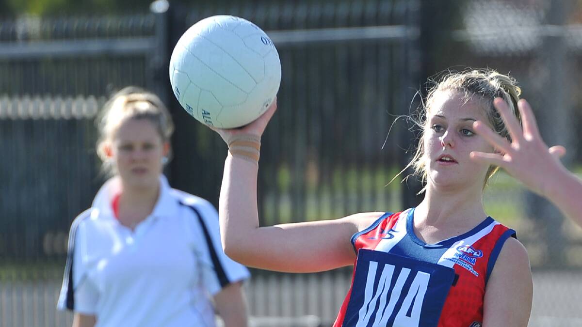 Sheridan Valenta looks to pass to a Riverina league teammate in the under 17s. Picture: Addison Hamilton