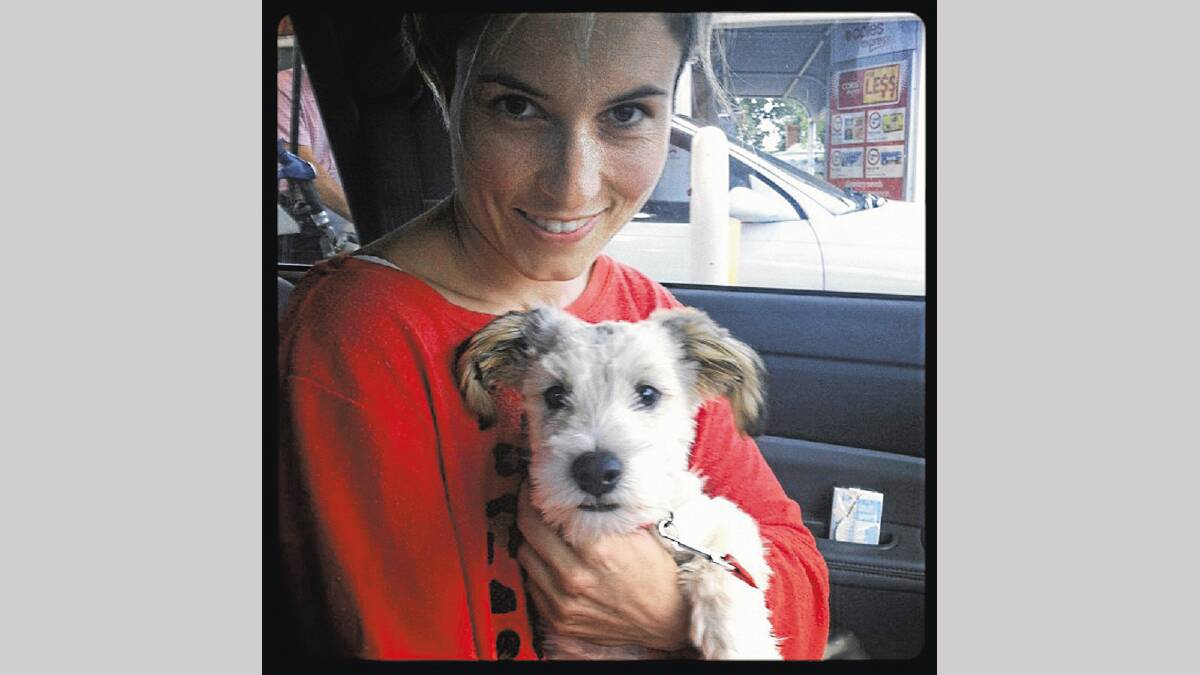 BRUSH WITH FAME: Australian songwriter, singer and multi-award winner Missy Higgins was in Griffith recently to adopt Needy Paws rescue dog Gizmo.