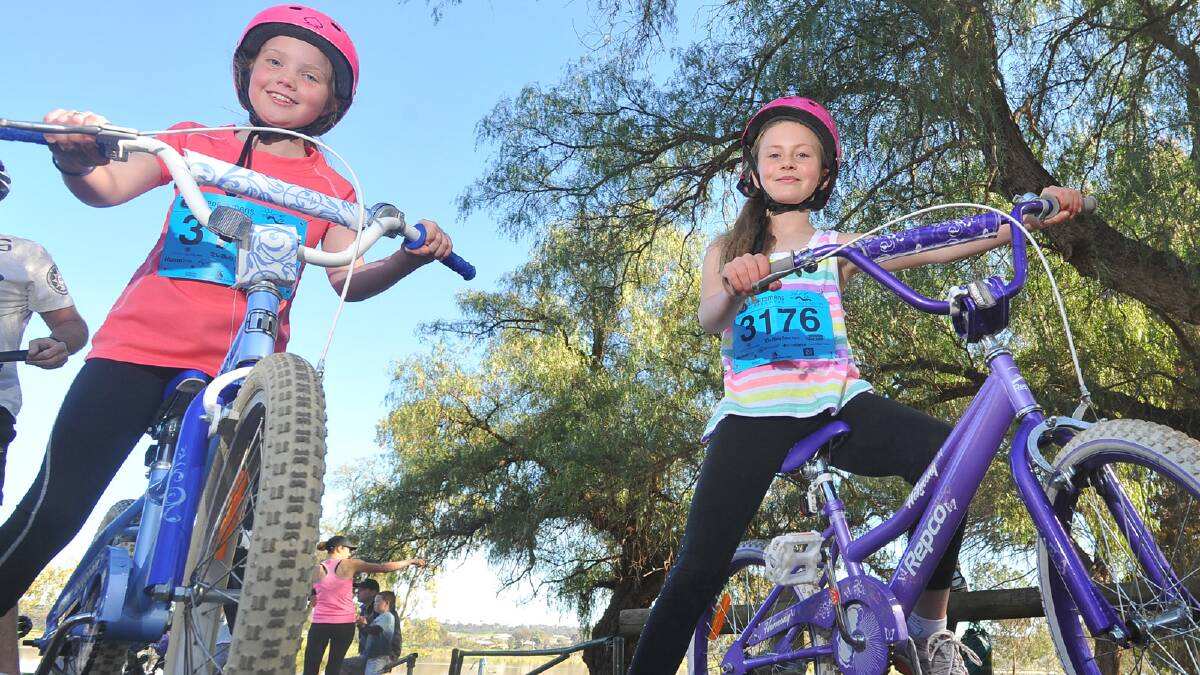 Lake to Lagoon 2013 - Nine year olds Isabella Miller and Milana Blacklock ready for the bike race. Picture: Addison Hamilton