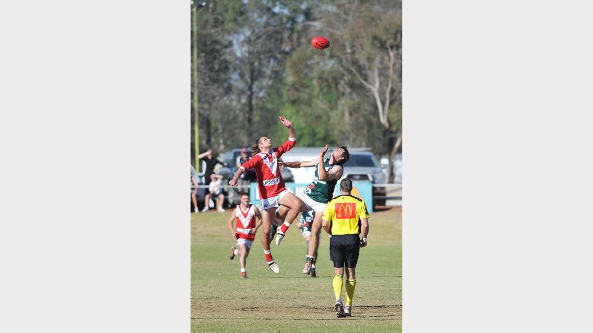 CAK's Josh Meiselbach and Coolamon's Ben Edyvean leap for the centre bounce. Picture: Alastair Brook