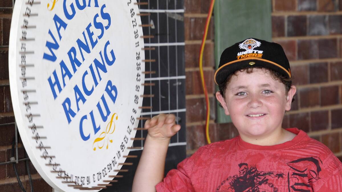 Luke Quince, 10, at the Wagga Harness Racing Club's Christmas meeting. Picture: Les Smith