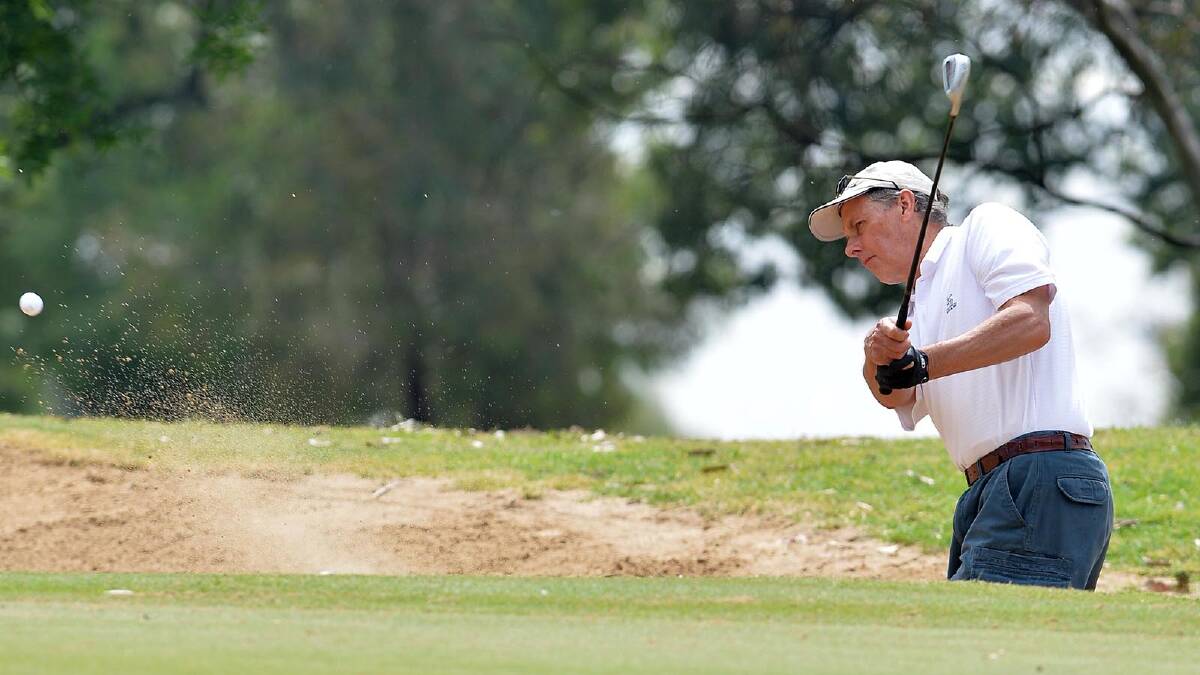 Barry Stevenson hits out of the sand on 9th during the second round of the Country Club Championships. Picture: Michael Frogley