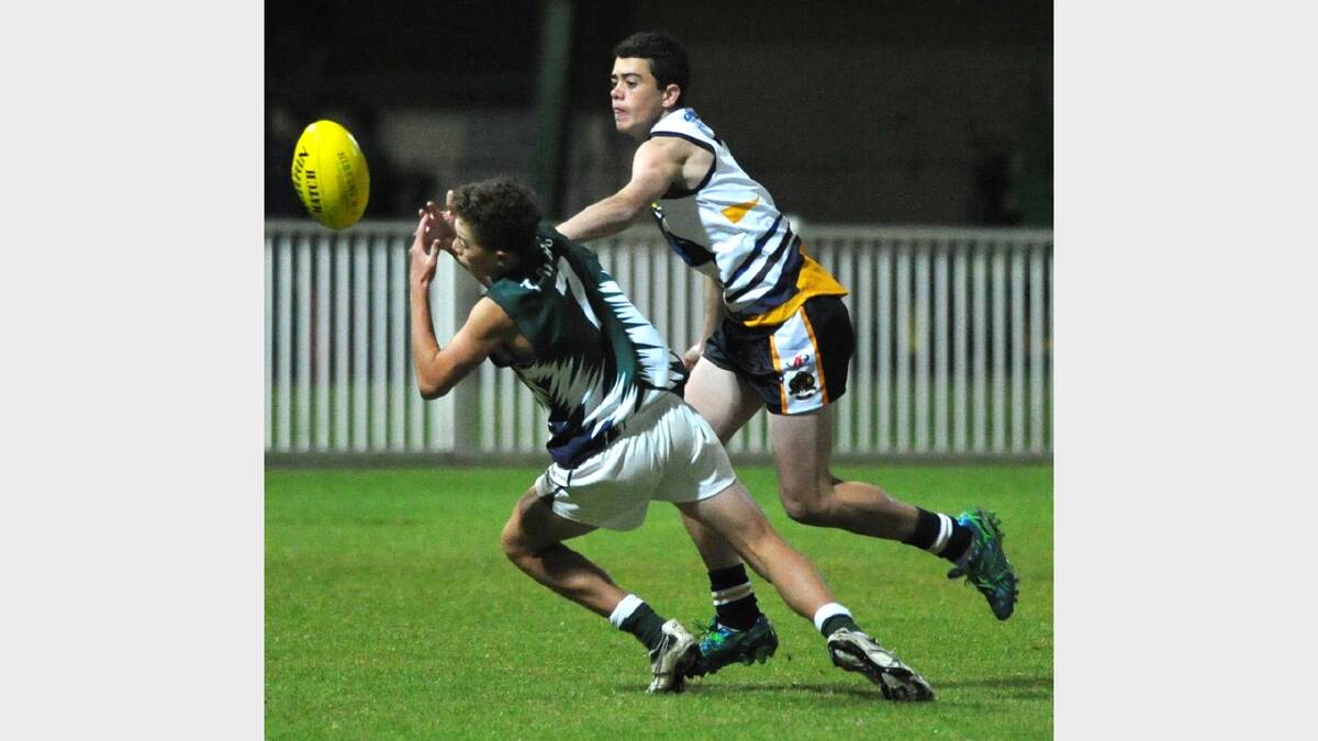 TRAC's Sam Glyde (left) and Kooringal's Liam Carey compete for the ball. Picture: Les Smith