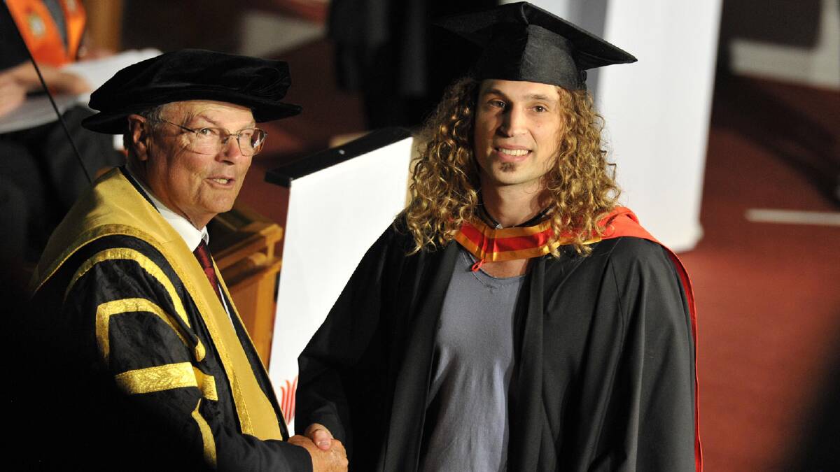 Mark Giles recieves his bachelor of medical radiation science. Picture: Les Smith