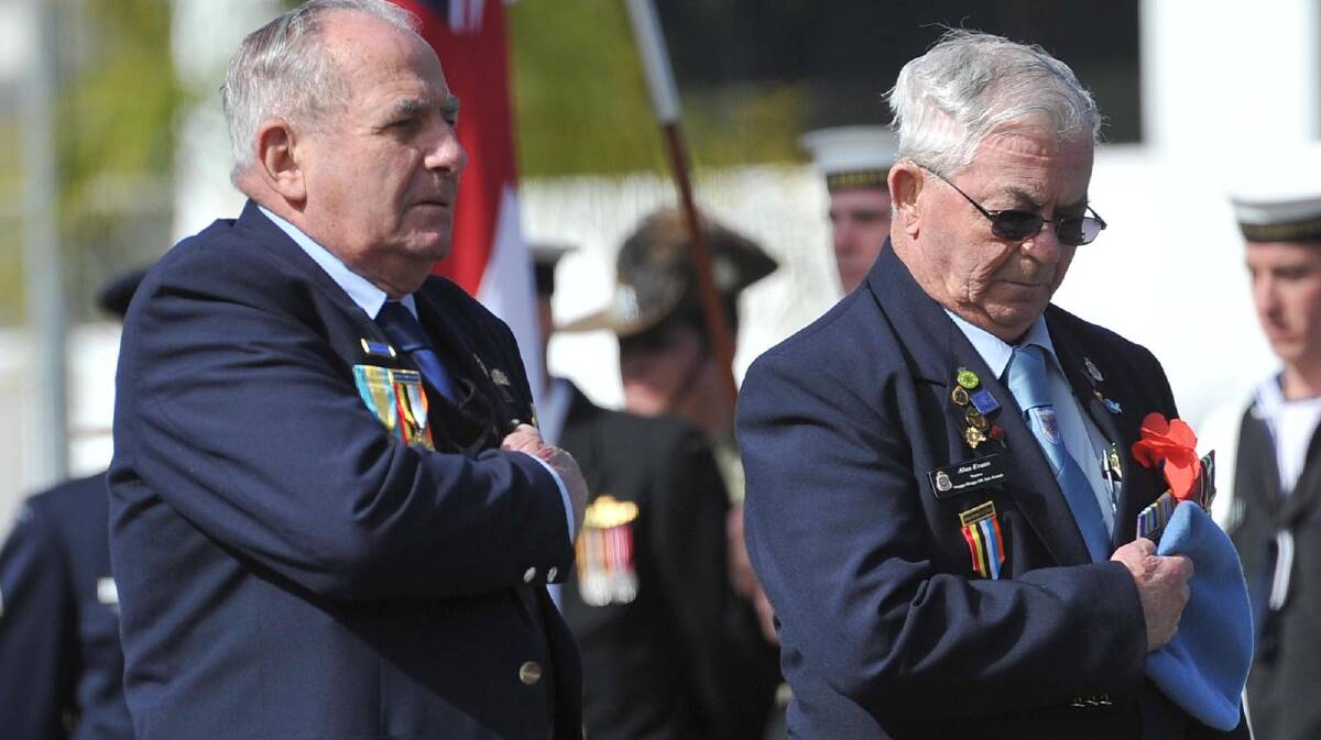Korean Veterans Harry Edmunds and Alan Evans laying wreaths Anzac Day march in Wagga. Picture: Michael Frogley