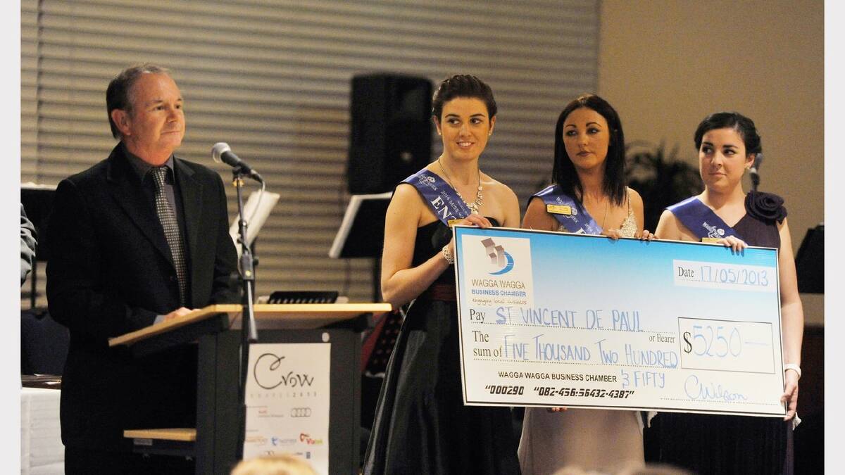 Miss Wagga entrants Kathryn Brooks, Samantha Brunskill, Jane Morton presenting a cheque to St Vincent de Paul's at the Crow Awards. Picture: Alastair Brook
