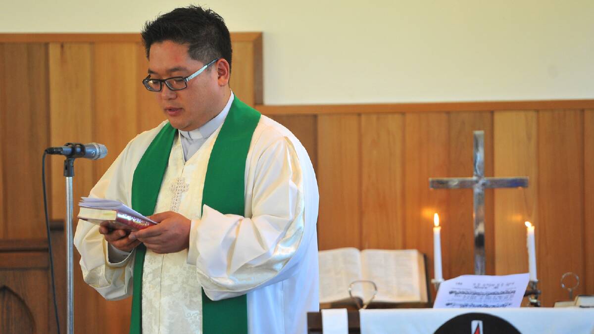 Reverend Daniel Yang gives a sermon at The Rock Uniting Church centenary celebrations. Picture: Addison Hamilton