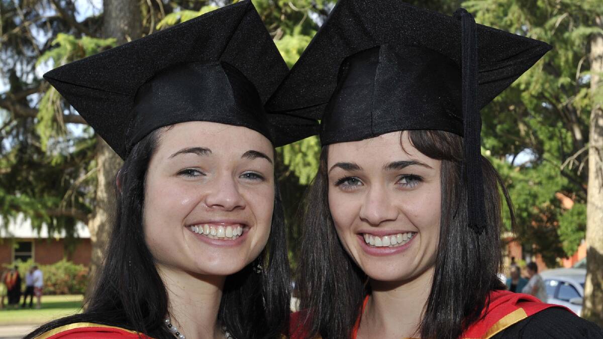Wagga twins Jessica and Lauren Said both graduated with a degree of veterinary biology/veterinary science. Picture: Les Smith