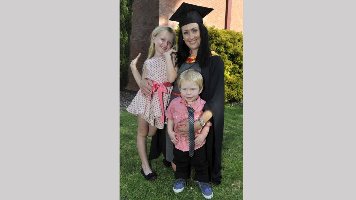Nursing graduate Lisa Drury with daughter Isla, 6, and 17-month-old son Mannix. Picture: Les Smith
